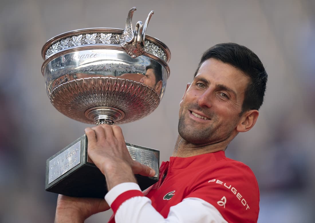 Jun 13, 2021; Paris, France; Novak Djokovic (SRB) poses with the trophy after winning the men