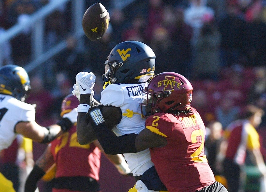Iowa State Cyclones defensive back T.J. Tampa (2) knocks the ball out from West Virginia Mountaineers wide receiver Bryce Ford-Wheaton (0) during the first half in the Big-12 showdown at Jack Trice Stadium Saturday, Nov. 5. 2022, in Ames, Iowa.
Ncaa Football Baylor At Iowa State