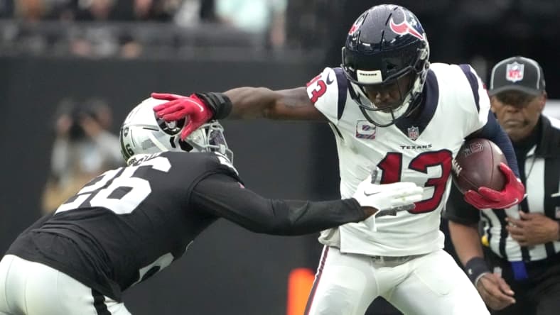 brandin cooks lands with the green bay packers