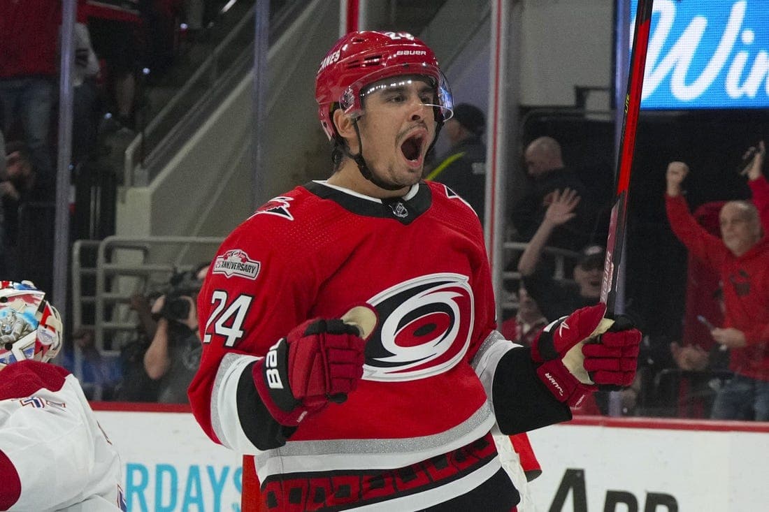 Feb 16, 2023; Raleigh, North Carolina, USA; Carolina Hurricanes center Seth Jarvis (24) celebrates his goal against the Montreal Canadiens during the first period at PNC Arena. Mandatory Credit: James Guillory-USA TODAY Sports