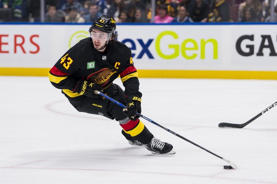 Oct 31, 2023; Vancouver, British Columbia, CAN; Vancouver Canucks defenseman Quinn Hughes (43) handles the puck against the Nashville Predators in the first period at Rogers Arena. Mandatory Credit: Bob Frid-USA TODAY Sports