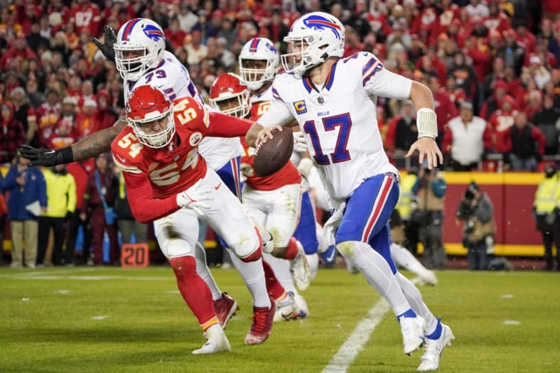 Dec 10, 2023; Kansas City, Missouri, USA; Buffalo Bills quarterback Josh Allen (17) scrambles as Kansas City Chiefs lineback…