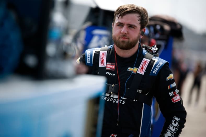 KADEN HONEYCUTT walks pit road before qualifying for the Clean Harbors 250 in Richmond , VA, USA.
