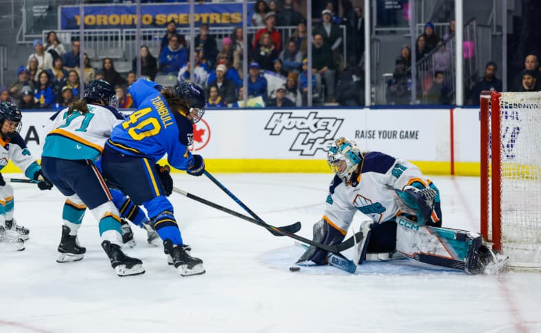 Toronto Sceptres forward Blayre Turnbull gets denied by New York Sirens goalie Kayle Osborne.