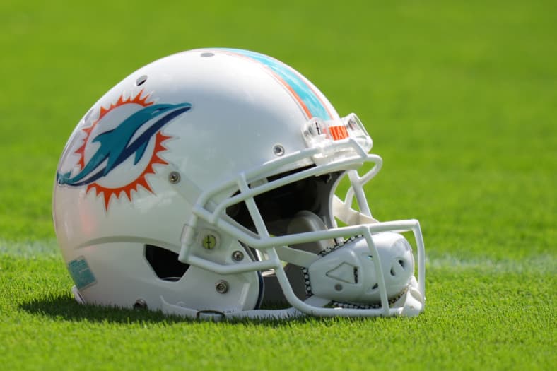 Aug 17, 2022; Miami Gardens, Florida, US; A general view of a Miami Dolphins helmet on the field during practice at Baptist…