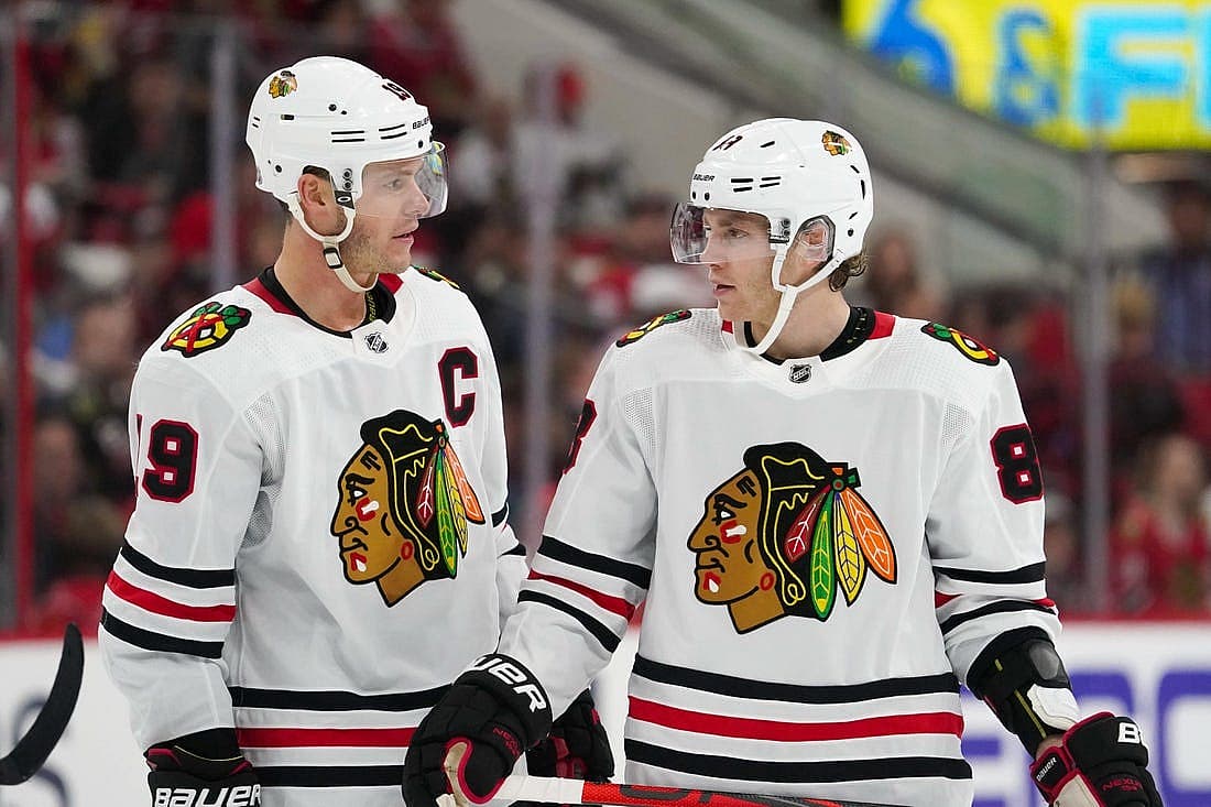 Oct 26, 2019; Raleigh, NC, USA; Chicago Blackhawks center Jonathan Toews (19) and right wing Patrick Kane (88) talk against the Carolina Hurricanes at PNC Arena. The Carolina Hurricanes defeated the Chicago Blackhawks 4-0. Mandatory Credit: James Guillory-USA TODAY Sports