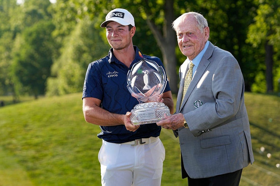 June 4, 2023; Dublin, Ohio, USA; Viktor Hovland stands with Jack Nicklaus and the trophy after winning in a playoff over Denny McCarthy during the final round of the Memorial Tournament at Muirfield Village Golf Club.