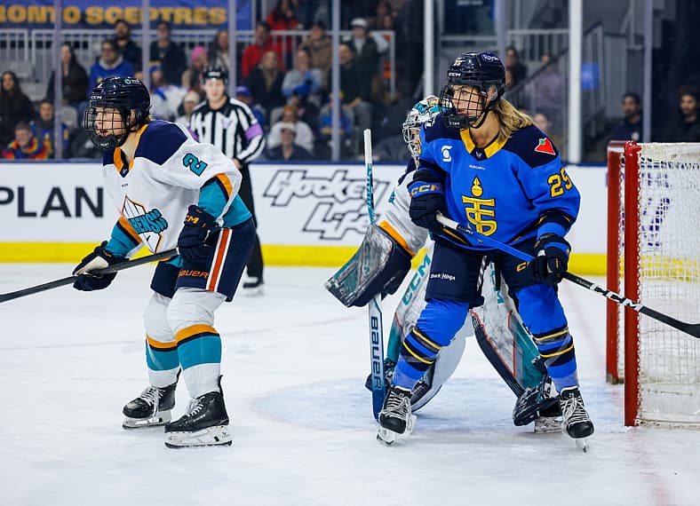 New York Sirens defender Dayle Ross protects goalie Kayle Osborne.