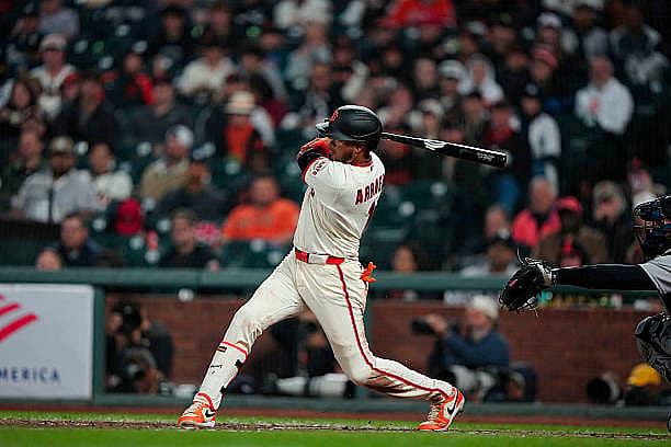 SAN FRANCISCO, CALIFORNIA – MARCH 25: Luis Arraez #1 of the San Francisco Giants singles during the game at Oracle Park on M…