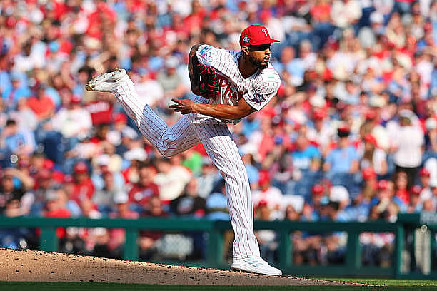 PHILADELPHIA, PA – MARCH 26: Cristopher Sánchez #61 of the Philadelphia Phillies pitches during the game against the Texas R…