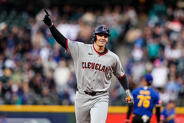 SEATTLE, WASHINGTON – MARCH 27: Chase DeLauter #24 of the Cleveland Guardians celebrates after hitting a home run on a fly b…