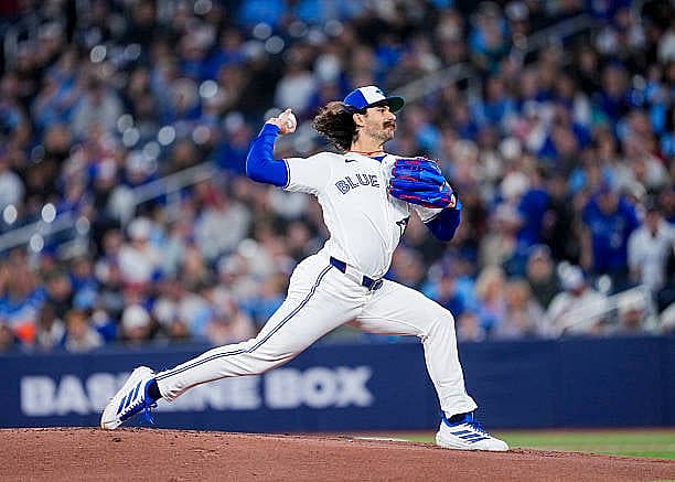 TORONTO, CANADA – MARCH 28: Dylan Cease #84 of the Toronto Blue Jays pitches against the Athletics during the first inning i…