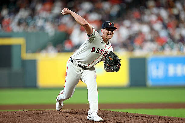 HOUSTON, TEXAS – MARCH 26: Hunter Brown #58 of the Houston Astros pitches in the second inning against the Los Angeles Angel…