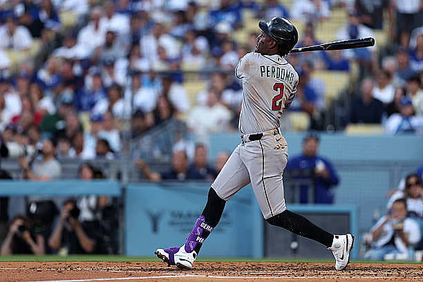 LOS ANGELES, CALIFORNIA – MARCH 26: Geraldo Perdomo #2 of the Arizona Diamondbacks hits a two-run home run during the fourth…