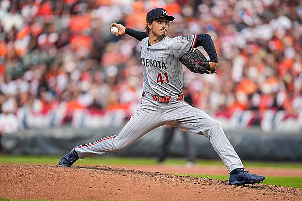 BALTIMORE, MD – MARCH 26: Joe Ryan #41 of the Minnesota Twins pitches during a game against the Baltimore Orioles on March 2…