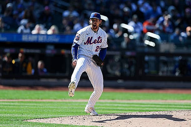 NEW YORK, NEW YORK – MARCH 29: Nolan McLean #26 of the New York Mets reacts after pitching during the fifth inning against t…
