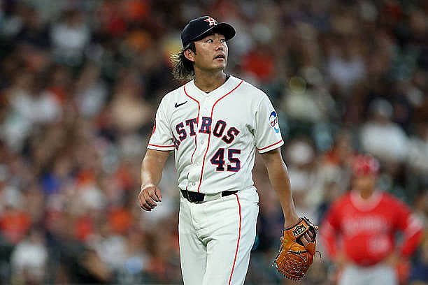 HOUSTON, TEXAS – MARCH 29: Tatsuya Imai #45 of the Houston Astros reacts in the second inning of his MLB debut against the L…
