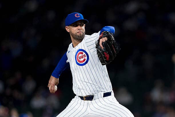 CHICAGO, ILLINOIS – SEPTEMBER 19: Jorge Lopez #41 of the Chicago Cubs pitches in a game against the Oakland Athletics at Wri…