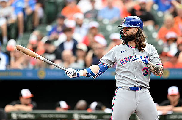 BALTIMORE, MARYLAND – JULY 10: Jesse Winker #3 of the New York Mets bats against the Baltimore Orioles during game one of a…