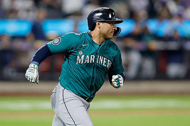 NEW YORK, NEW YORK – AUGUST 15:  Donovan Solano #39 of the Seattle Mariners in action against the New York Mets at Citi Fiel…