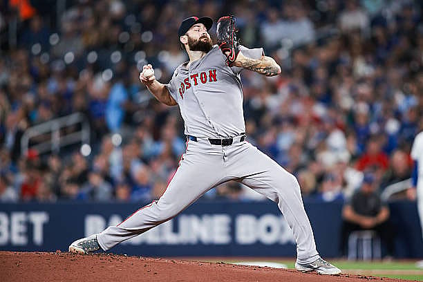TORONTO, CANADA – SEPTEMBER 23: Lucas Giolito #54 of the Boston Red Sox pitches in the first inning of their MLB game agains…