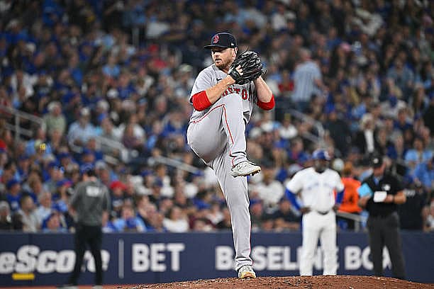 TORONTO, ON – SEPTEMBER 23: Justin Wilson #32 of the Boston Red Sox pitches during the game between the Boston Red Sox and t…