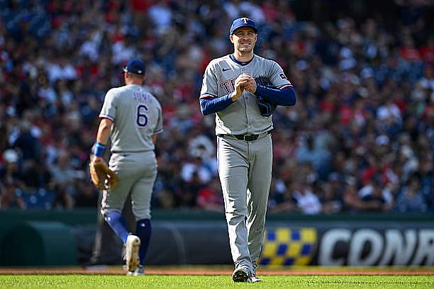 CLEVELAND, OHIO – SEPTEMBER 28: Patrick Corbin #46 of the Texas Rangers looks on during the first inning against the Clevela…
