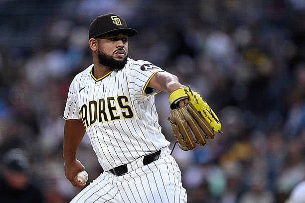 SAN DIEGO, CALIFORNIA – APRIL 09: Randy Vasquez #98 of the San Diego Padres pitches against the Colorado Rockies during the…