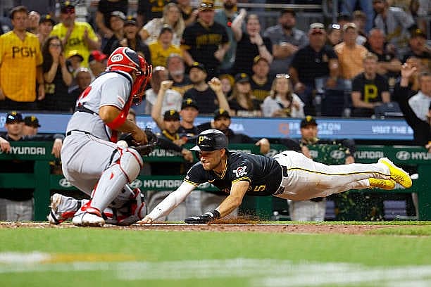 PITTSBURGH, PA – APRIL 13:  Brandon Lowe #5 of the Pittsburgh Pirates scores on a three RBI triple in the sixth inning again…