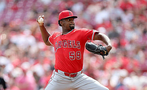 CINCINNATI, OHIO – APRIL 12: Jose Soriano #59 of the Los Angeles Angels throws a pitch against against the Cincinnati Reds a…