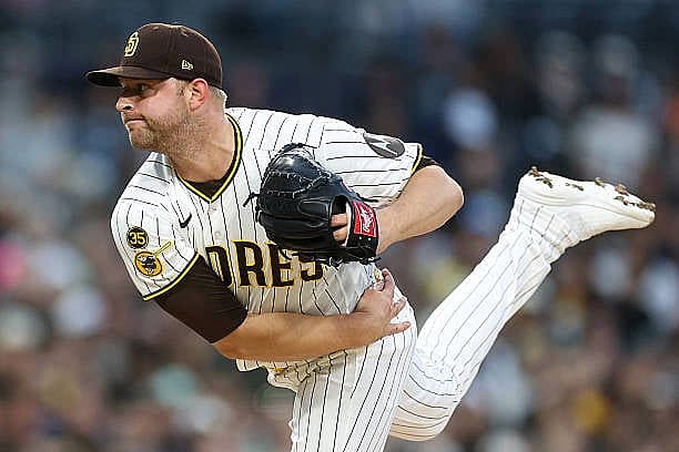 SAN DIEGO, CALIFORNIA – APRIL 14: Michael King #34 of the San Diego Padres pitches during the third inning of a game against…