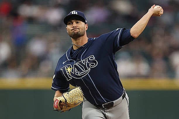 CHICAGO, ILLINOIS – APRIL 14: Shane McClanahan #18 of the Tampa Bay Rays delivers a pitch during the second inning against t…