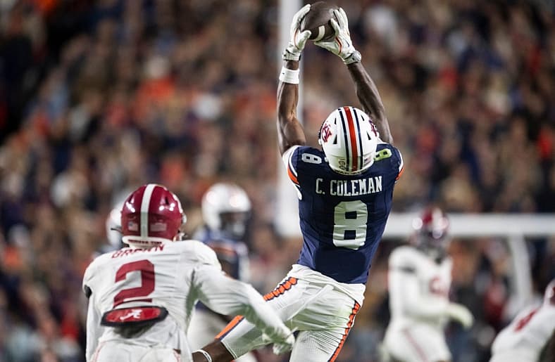 Auburn Tigers wide receiver Cam Coleman (8) catches a pass as Auburn Tigers take on Alabama Crimson Tide in the Iron Bowl at