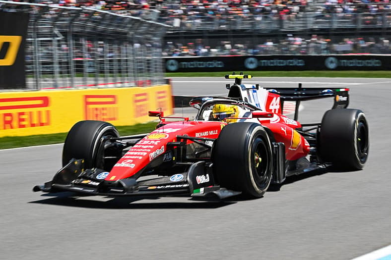 Lewis Hamilton steering the Ferrari SF-26 aduo