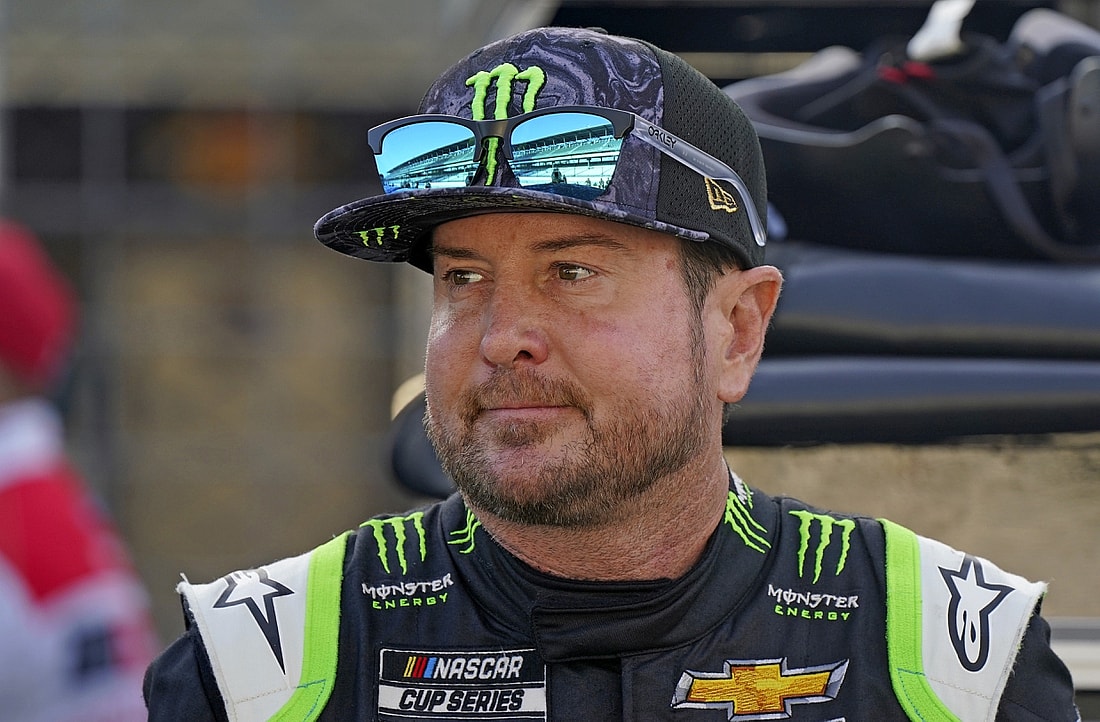 Aug 15, 2021; Speedway, Indiana, USA; NASCAR Cup Series driver Kurt Busch (1) looks on before the Verizon 200 at the Brickyard at Indianapolis Motor Speedway Road Course. Mandatory Credit: Mike Dinovo-USA TODAY Sports