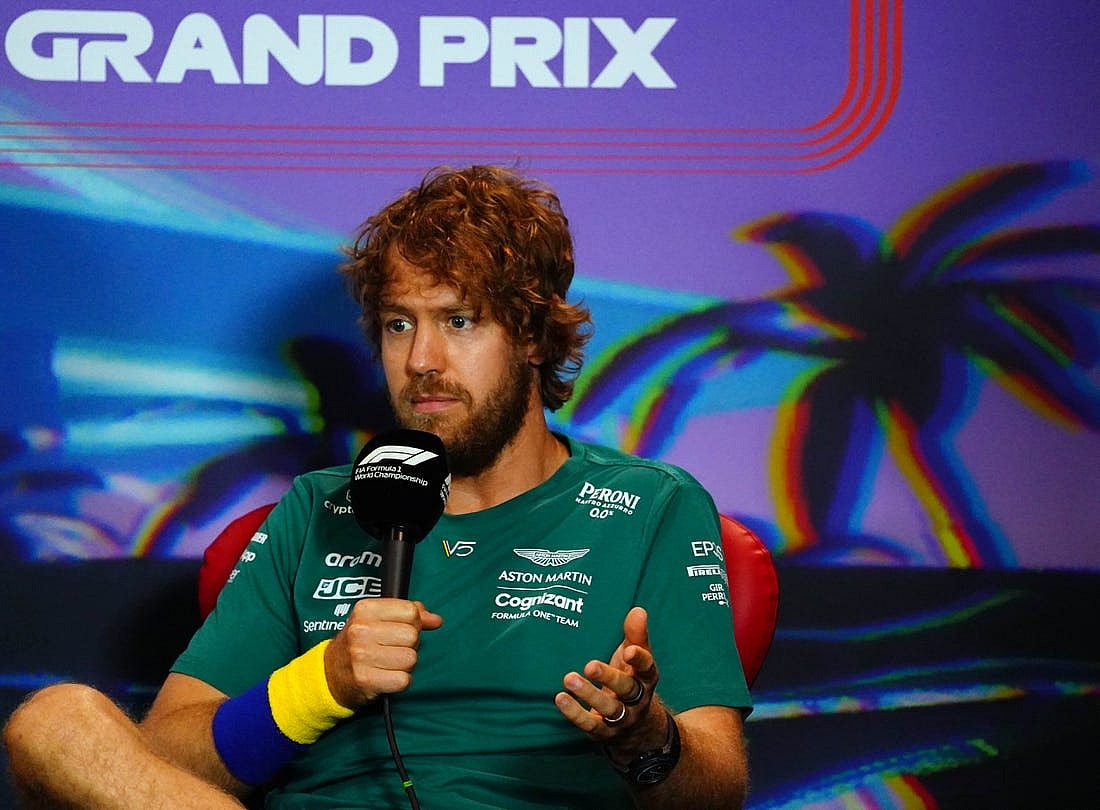 May 6, 2022; Miami Gardens, Florida, USA; Aston Martin driver Sebastian Vettel of Germany talks with the media during a press conference before their practice session for the Miami Grand Prix at Miami International Autodrome. Mandatory Credit: John David Mercer-USA TODAY Sports