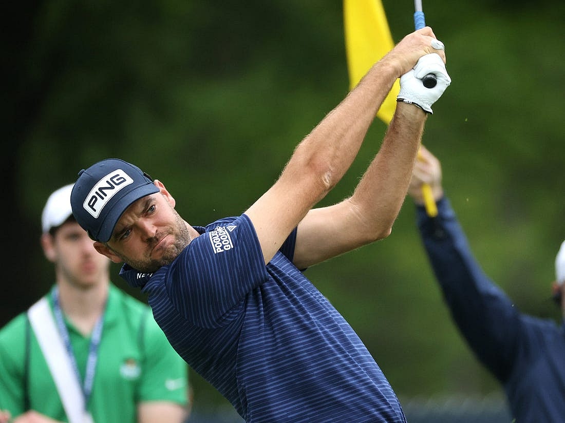 Corey Conners hits his tee shot the 7th-hole.