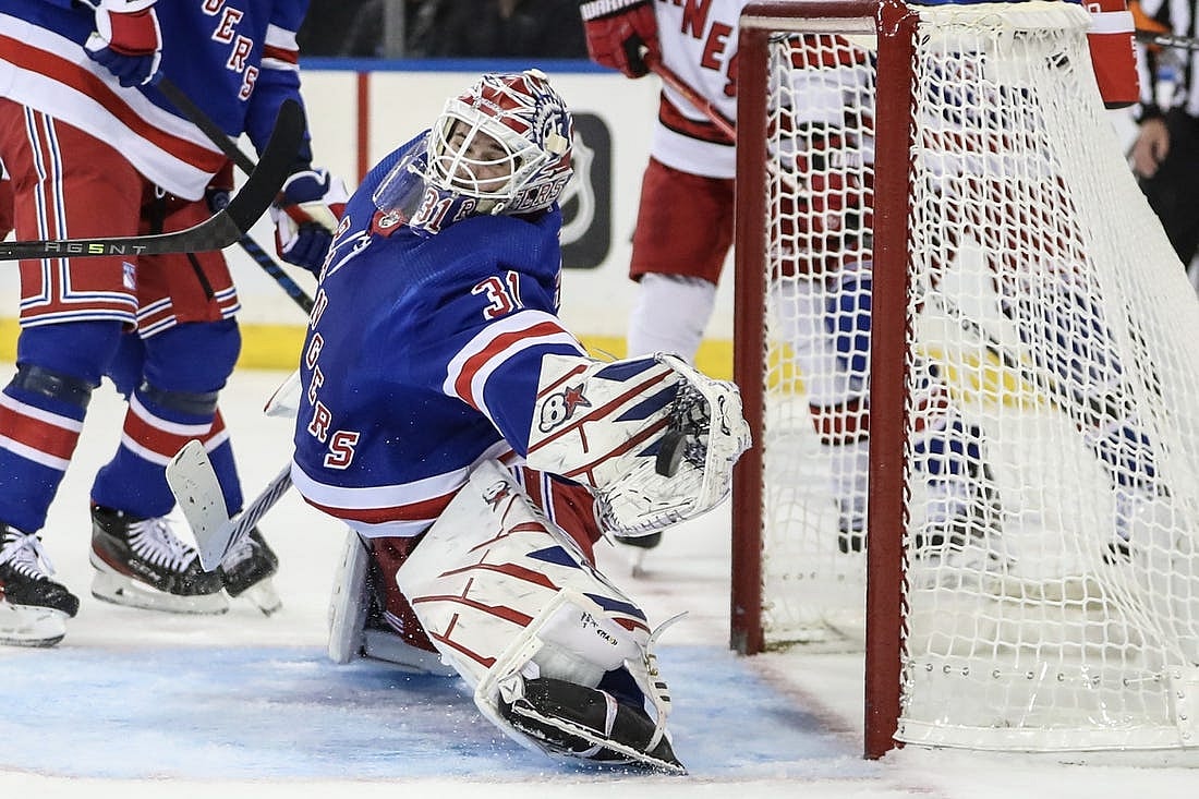 Nov 2, 2023; New York, New York, USA; New York Rangers goaltender Igor Shesterkin (31) makes a save on a shot on goal attempt in the third period against the Carolina Hurricanes at Madison Square Garden. Mandatory Credit: Wendell Cruz-USA TODAY Sports
