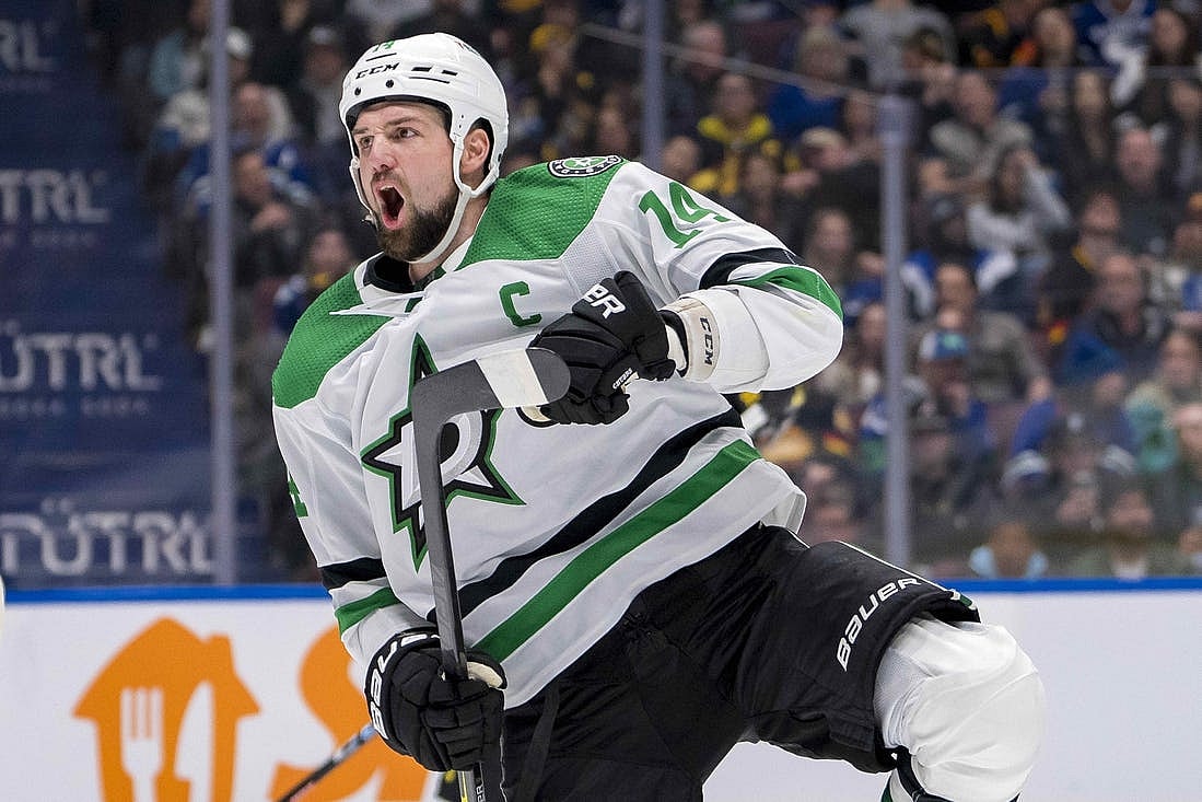 Mar 28, 2024; Vancouver, British Columbia, CAN; Dallas Stars forward Jamie Benn (14) celebrates his goal against the Vancouver Canucks in the third period at Rogers Arena. Dallas won 3 - 1. Mandatory Credit: Bob Frid-USA TODAY Sports