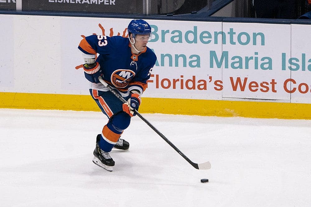 Casey Cizikas skates with the puck during the third period of the National Hockey League game between the Washington Capitals and the New York Islanders.