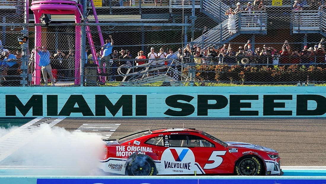 Oct 23, 2022; Homestead, Florida, USA; NASCAR Cup Series driver Kyle Larson (5) celebrates winning the Dixie Vodka 400 at Homestead-Miami Speedway. Mandatory Credit: John David Mercer-USA TODAY Sports