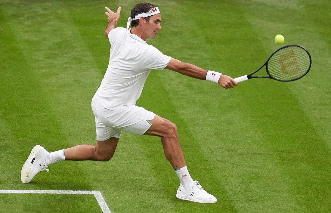 Jun 29, 2021; London, United Kingdom; Roger Federer (SUI) in action Adrian Mannarino (FRA) in first round singles on centre court at All England Lawn Tennis and Croquet Club. Mandatory Credit: Peter Van den Berg-USA TODAY Sports