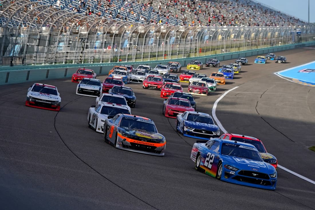 Feb 27, 2021; Miami, FL, USA; NASCAR Xfinity Series driver Austin Cindric (22) leads the field to restart the Contender Boats 250 at Homestead-Miami Speedway. Mandatory Credit: Jasen Vinlove-USA TODAY Sports