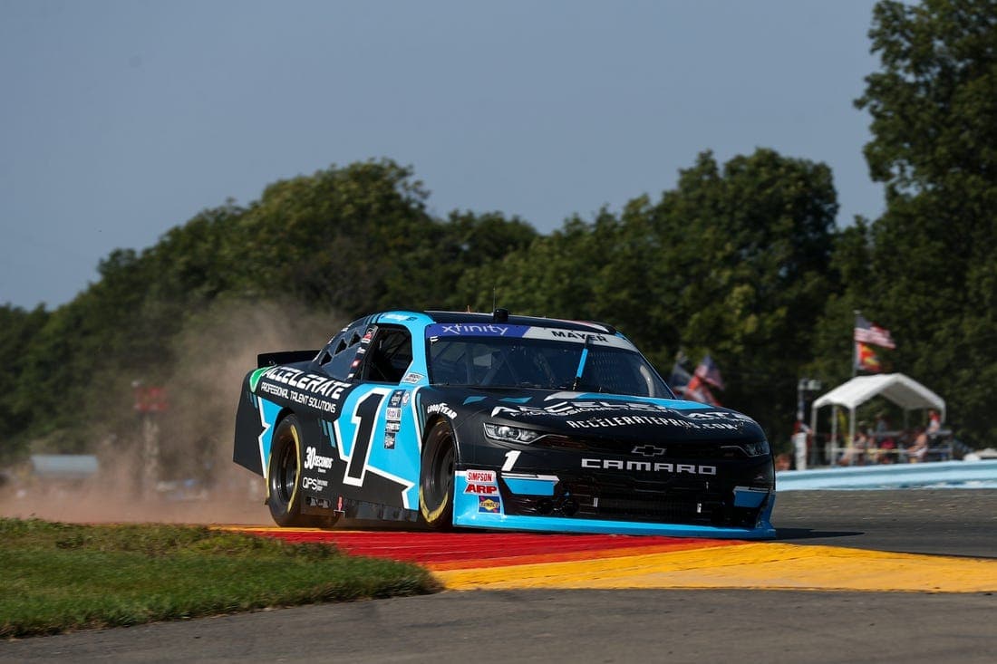 Aug 19, 2023; Watkins Glen, New York, USA; NASCAR Xfinity Series driver Sam Mayer (1) races during the Shriners Children s 200 at Watkins Glen International. Mandatory Credit: Matthew O'Haren-USA TODAY Sports