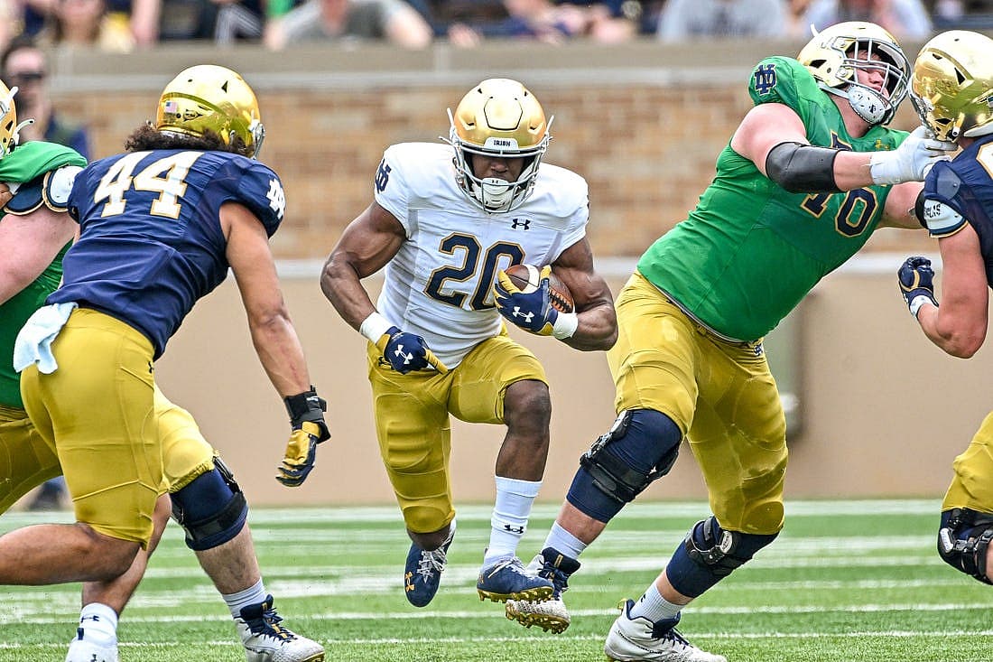 Apr 23, 2022; Notre Dame, Indiana, USA; Notre Dame Fighting Irish running back Jadarian Price (20) carries in the first quarter of the Blue-Gold Game at Notre Dame Stadium. Mandatory Credit: Matt Cashore-USA TODAY Sports