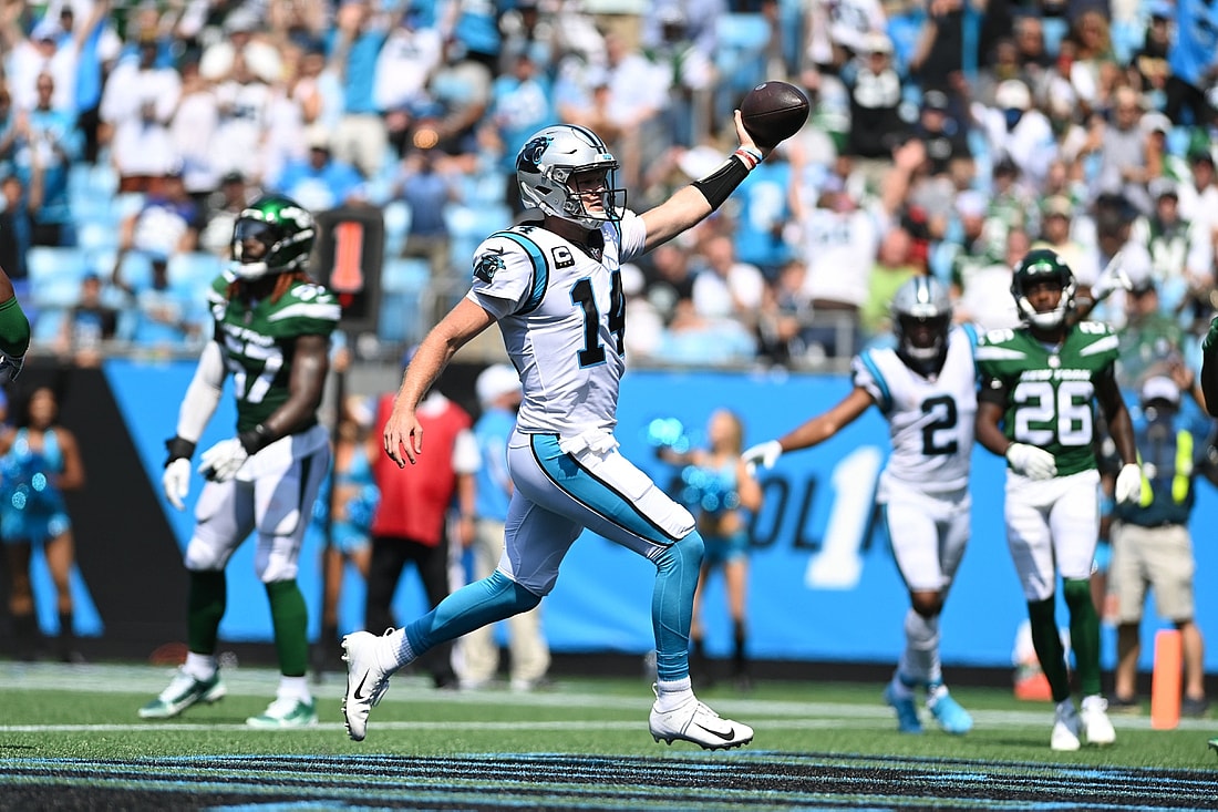 Sep 12, 2021; Charlotte, North Carolina, USA;  Carolina Panthers quarterback Sam Darnold (14) scores a touchdown in the second quarter at Bank of America Stadium. Mandatory Credit: Bob Donnan-USA TODAY Sports
