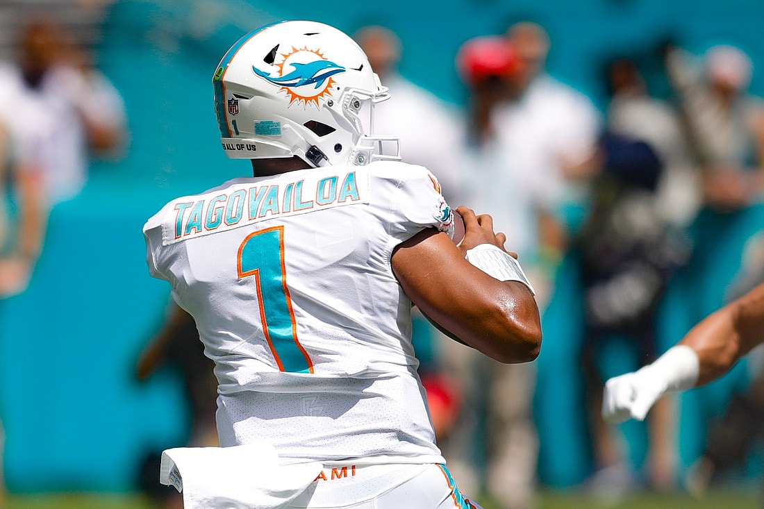 Sep 19, 2021; Miami Gardens, Florida, USA; Miami Dolphins quarterback Tua Tagovailoa (1) attempts to throw the football during the first quarter of the game against the Buffalo Bills at Hard Rock Stadium. Mandatory Credit: Sam Navarro-USA TODAY Sports