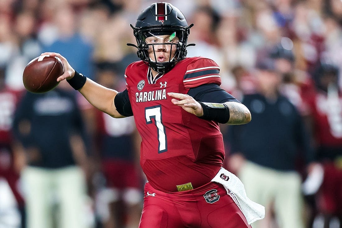 Oct 22, 2022; Columbia, South Carolina, USA; South Carolina Gamecocks quarterback Spencer Rattler (7) passes against the Texas A&M Aggies in the first quarter at Williams-Brice Stadium. Mandatory Credit: Jeff Blake-USA TODAY Sports