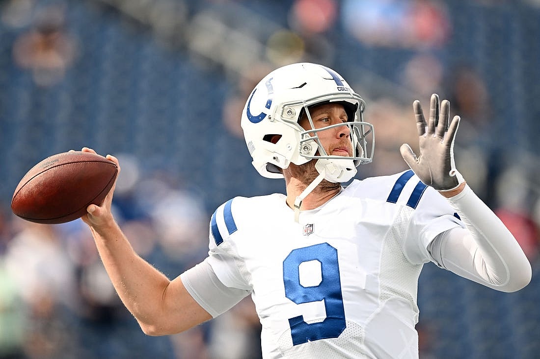 Nov 6, 2022; Foxborough, Massachusetts, USA; Indianapolis Colts quarterback Nick Foles (9) thows the ball during warmups before a game against the New England Patriots at Gillette Stadium. Mandatory Credit: Brian Fluharty-USA TODAY Sports