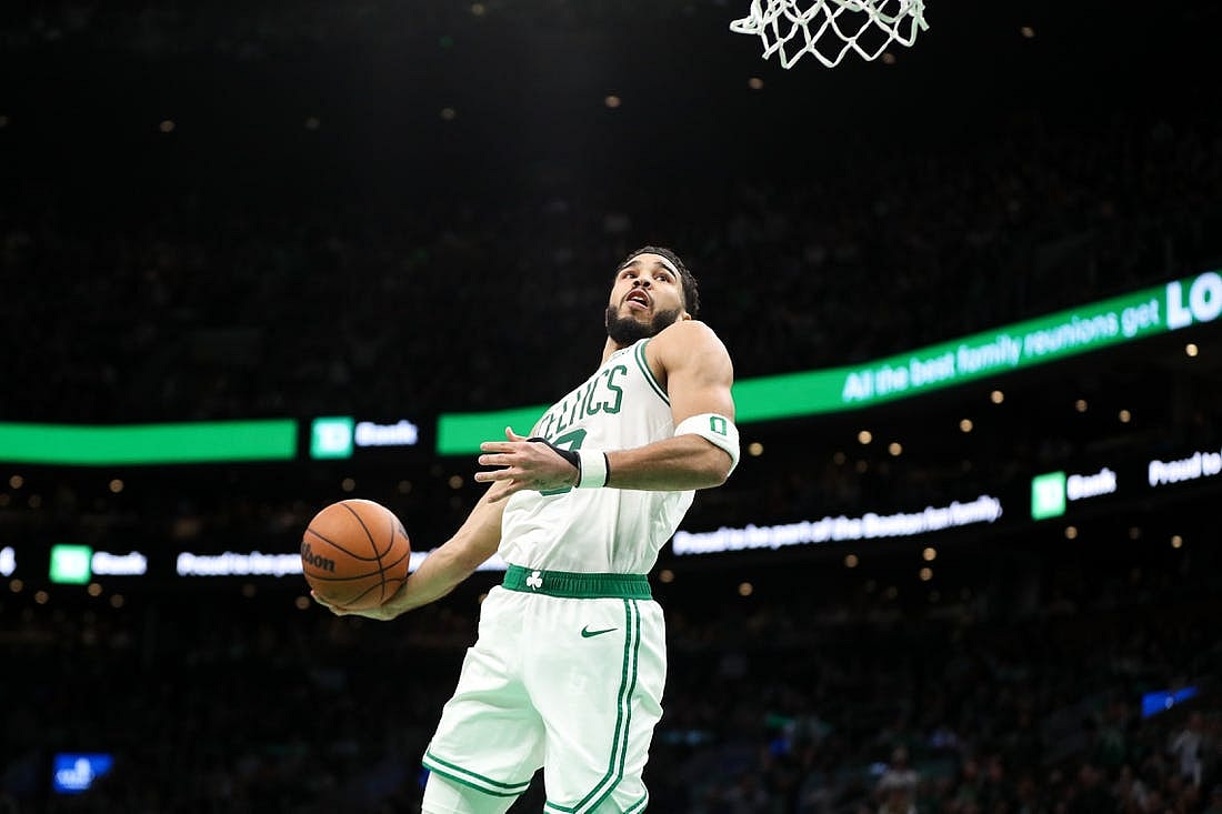 Dec 27, 2022; Boston, Massachusetts, USA; Boston Celtics forward Jayson Tatum (0) dunks the ball during the second half against the Houston Rockets at TD Garden. Mandatory Credit: Paul Rutherford-USA TODAY Sports
